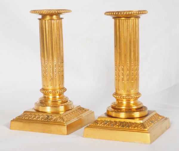 Pair of Louis XVI style ormolu candlesticks - 19th century
