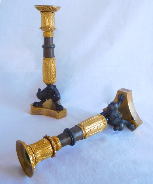 Pair of patinated bronze and ormolu tripod candlesticks, early 19th century