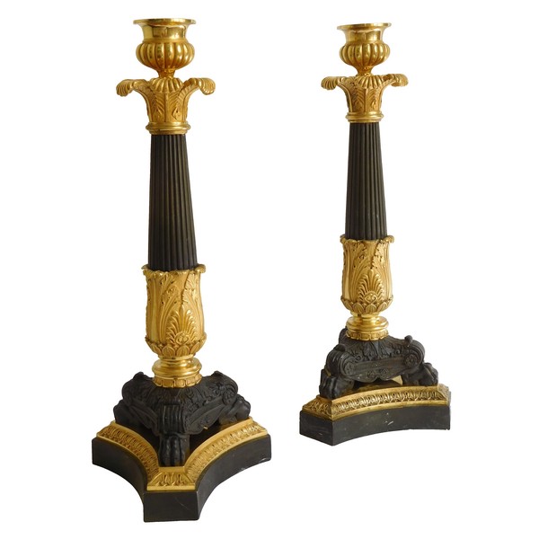 Pair of Empire patinated bronze and ormolu candlesticks, early 19th century circa 1820