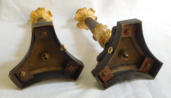 Pair of Empire patinated bronze and ormolu candlesticks, early 19th century circa 1820