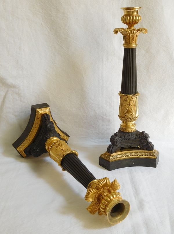 Pair of Empire patinated bronze and ormolu candlesticks, early 19th century circa 1820