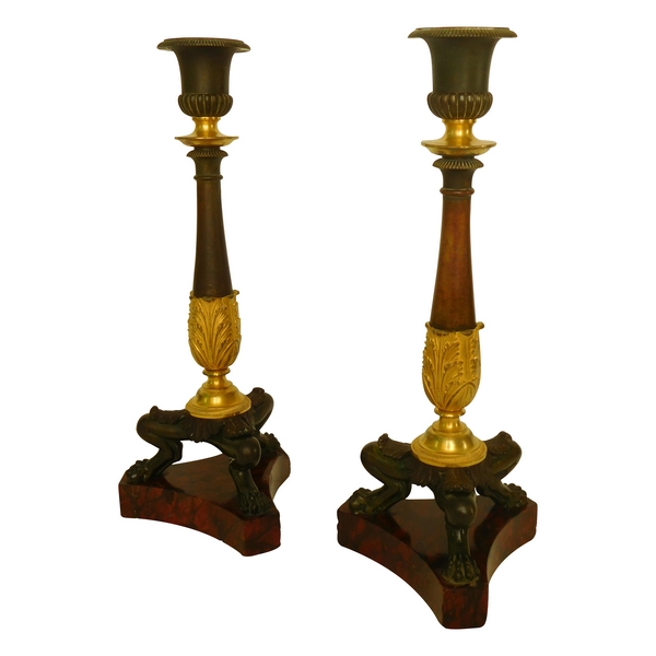 Pair of Empire ormolu, bronze and red marble candlesticks, early 19th century