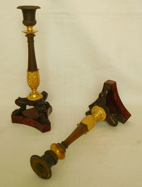 Pair of Empire ormolu, bronze and red marble candlesticks, early 19th century