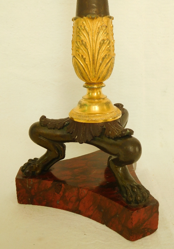 Pair of Empire ormolu, bronze and red marble candlesticks, early 19th century
