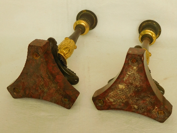 Pair of Empire ormolu, bronze and red marble candlesticks, early 19th century