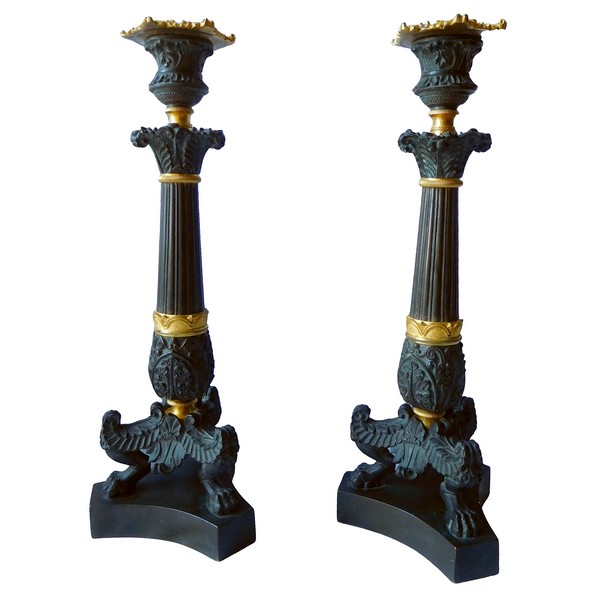 Pair of tripod ormolu and patinated bronze candlesticks, Empire style, early 19th century