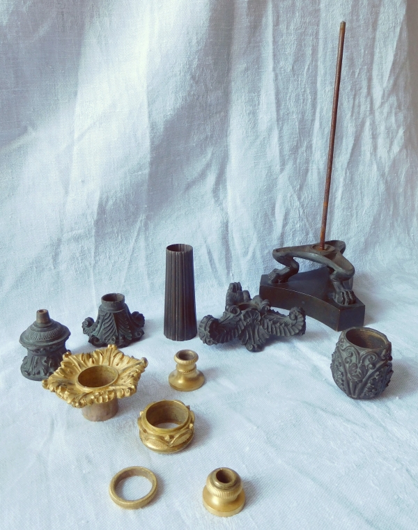 Pair of tripod ormolu and patinated bronze candlesticks, Empire style, early 19th century