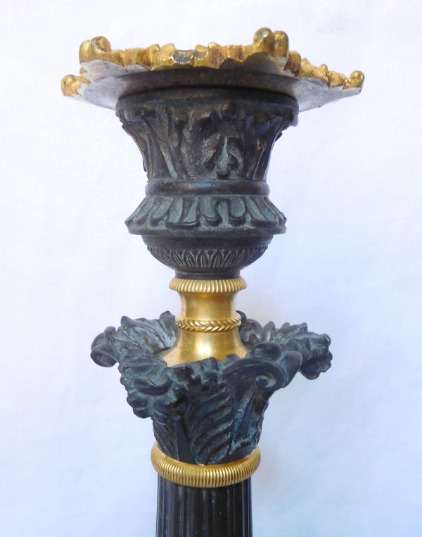 Pair of tripod ormolu and patinated bronze candlesticks, Empire style, early 19th century