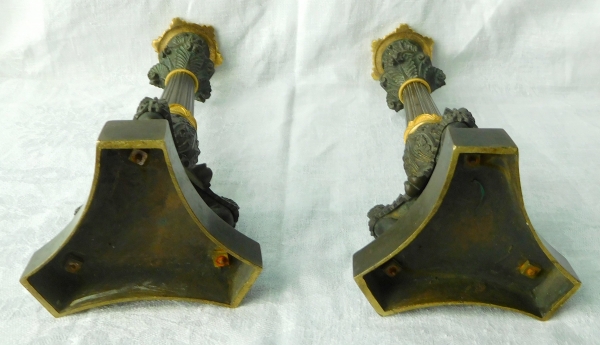 Pair of tripod ormolu and patinated bronze candlesticks, Empire style, early 19th century