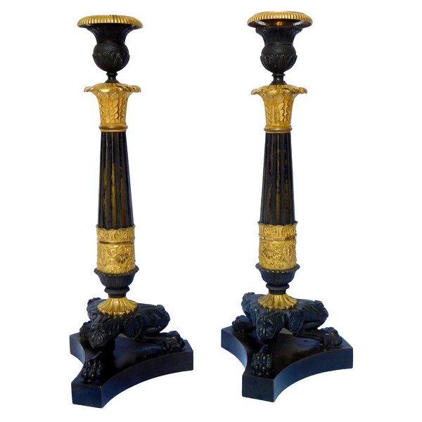 Pair of Empire patinated bronze and ormolu candlesticks, early 19th century circa 1820