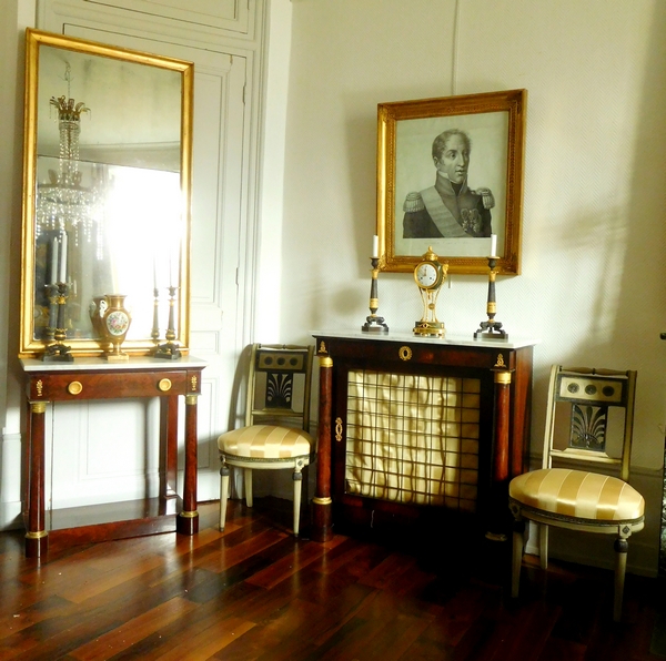 Pair of Empire patinated bronze and ormolu candlesticks, early 19th century circa 1820