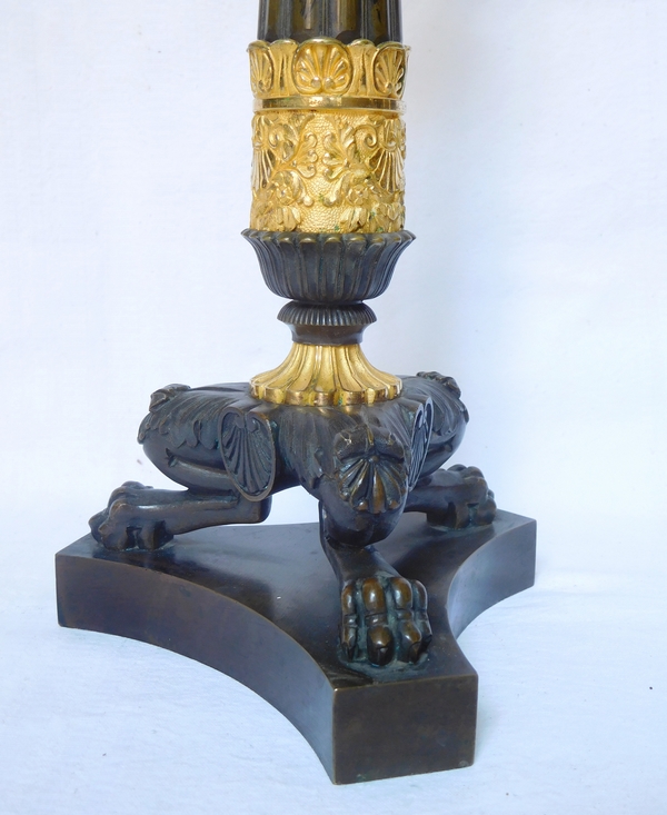 Pair of Empire patinated bronze and ormolu candlesticks, early 19th century circa 1820