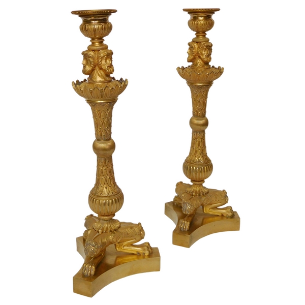 Pair of tripod ormolu candlesticks, late Empire period, early 19th century