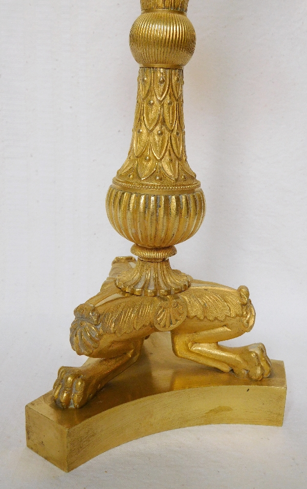 Pair of tripod ormolu candlesticks, late Empire period, early 19th century