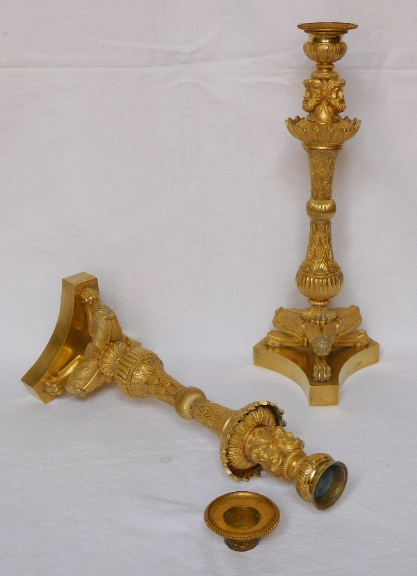 Pair of tripod ormolu candlesticks, late Empire period, early 19th century