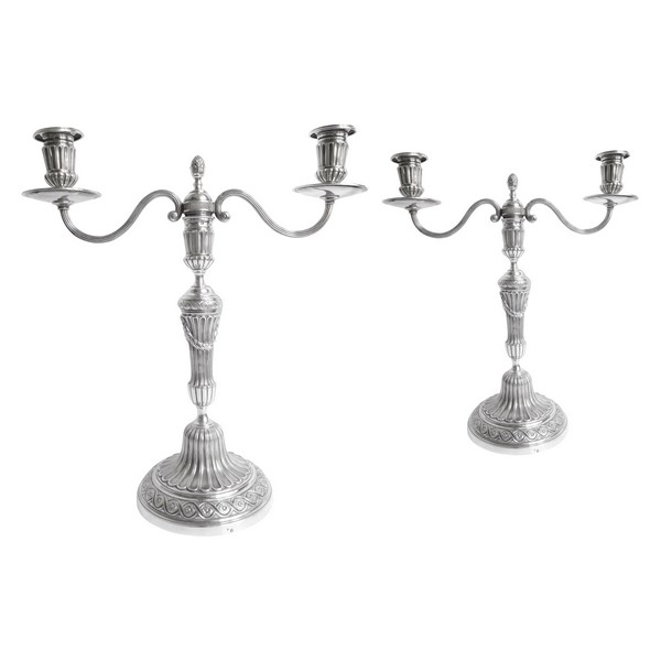 Paire de flambeaux candélabres de style Louis XVI en argent massif, poinçon Minerve