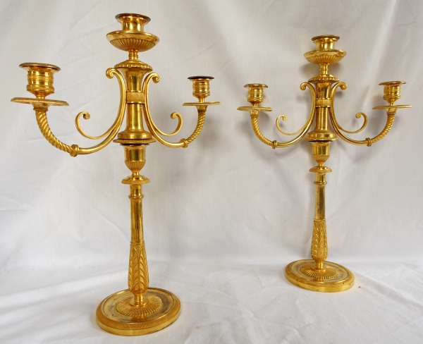 Claude Galle : paire de candélabres d'époque Empire en bronze doré au mercure