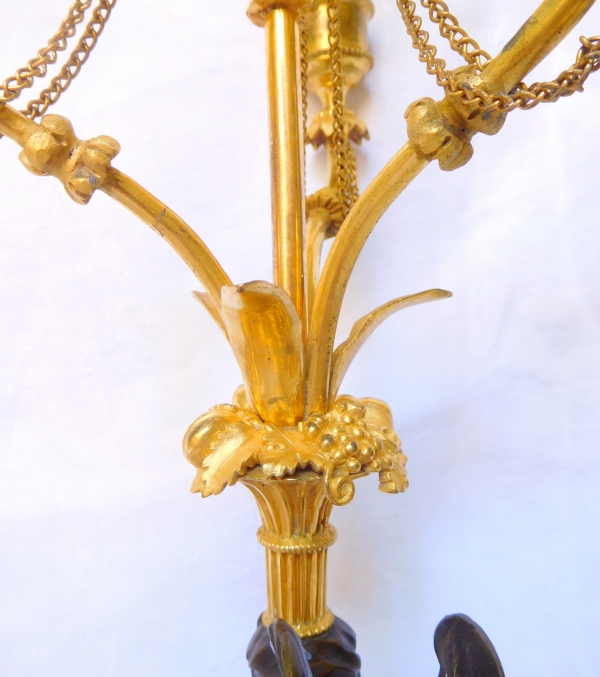 Pair of late 18th century ormolu and marble sphinxes-shaped candelabras