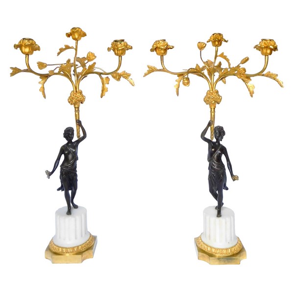 Paire de candélabres de style Louis XVI en marbre et bronze doré, début XIXe siècle