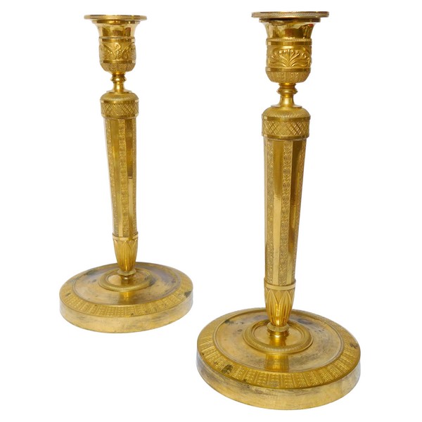 Pair of Empire ormolu candlesticks, early 19th century - 27cm