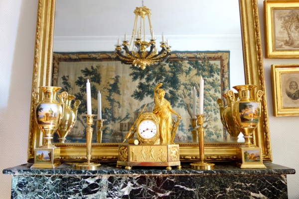 Pair of Empire ormolu candlesticks, early 19th century - 27cm