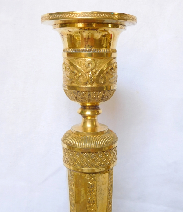 Pair of Empire ormolu candlesticks, early 19th century - 27cm