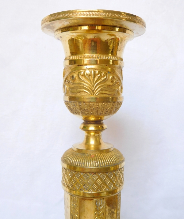 Pair of Empire ormolu candlesticks, early 19th century - 27cm