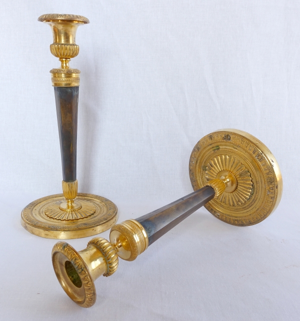 Pair of Empire ormolu and patinated bronze candlesticks attributed to Ravrio