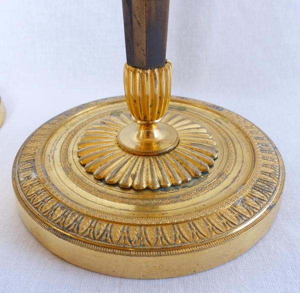 Pair of Empire ormolu and patinated bronze candlesticks attributed to Ravrio