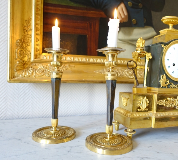 Pair of Empire ormolu and patinated bronze candlesticks attributed to Ravrio