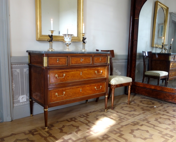 Pair of Directoire ormolu and bronze candlesticks, late 18th century