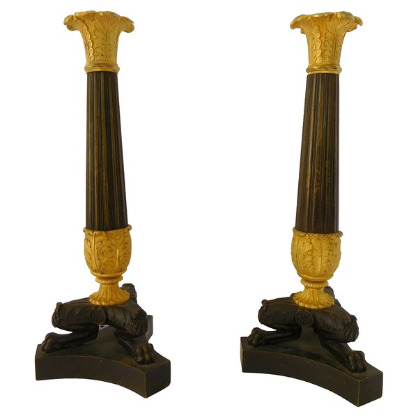 Pair of Empire patinated bronze and ormolu candlesticks, early 19th century circa 1830