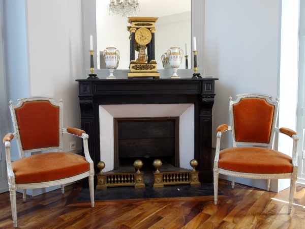 Pair of Empire patinated bronze and ormolu candlesticks, early 19th century circa 1830