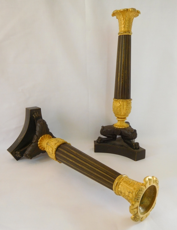 Pair of Empire patinated bronze and ormolu candlesticks, early 19th century circa 1830