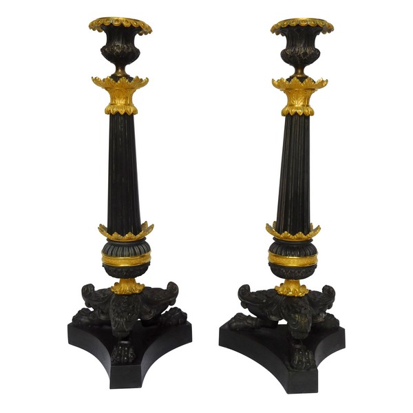 Pair of Empire patinated bronze and ormolu candlesticks, early 19th century circa 1820