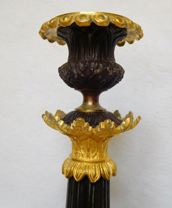 Pair of Empire patinated bronze and ormolu candlesticks, early 19th century circa 1820