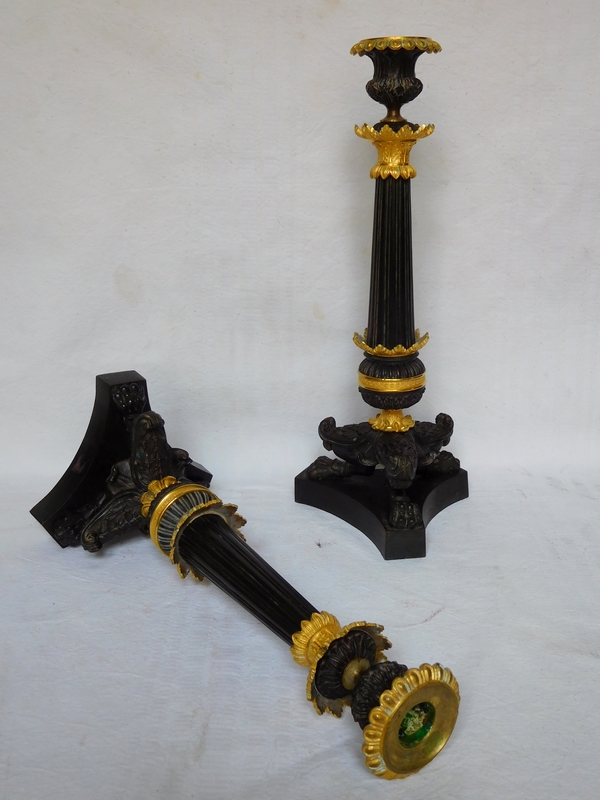 Pair of Empire patinated bronze and ormolu candlesticks, early 19th century circa 1820