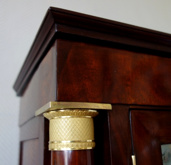 Meuble cabinet à secrets d'époque Empire en acajou et bronze doré au mercure