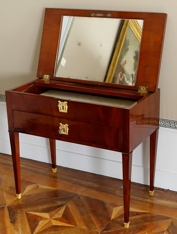 Empire mahogany dressing table for a man with a sliding top