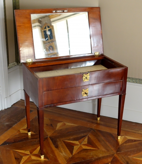 Empire mahogany dressing table for a man with a sliding top