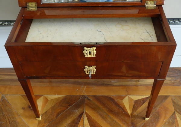 Empire mahogany dressing table for a man with a sliding top
