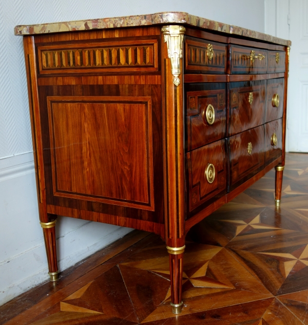 Louis XVI marquetry and ormolu commode, breche marble on top