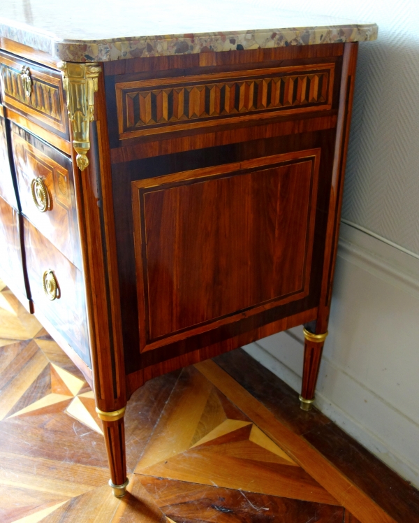 Louis XVI marquetry and ormolu commode, breche marble on top