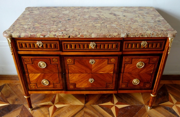 Louis XVI marquetry and ormolu commode, breche marble on top