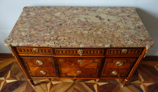 Louis XVI marquetry and ormolu commode, breche marble on top