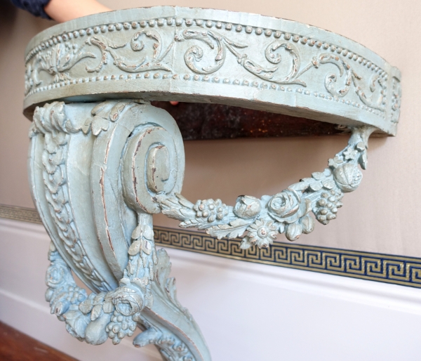 Louis XVI half-moon-shaped console in the taste of Jacob, patinated wood, 18th century