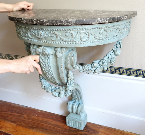 Louis XVI half-moon-shaped console in the taste of Jacob, patinated wood, 18th century