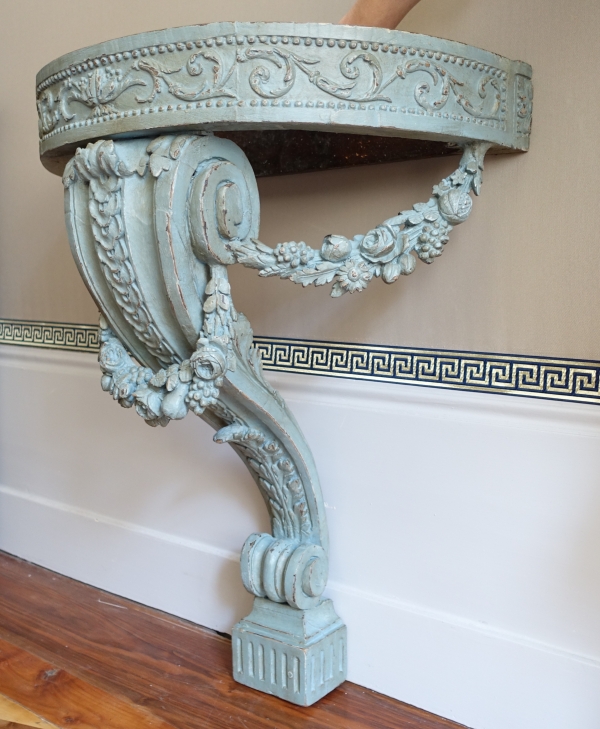 Louis XVI half-moon-shaped console in the taste of Jacob, patinated wood, 18th century