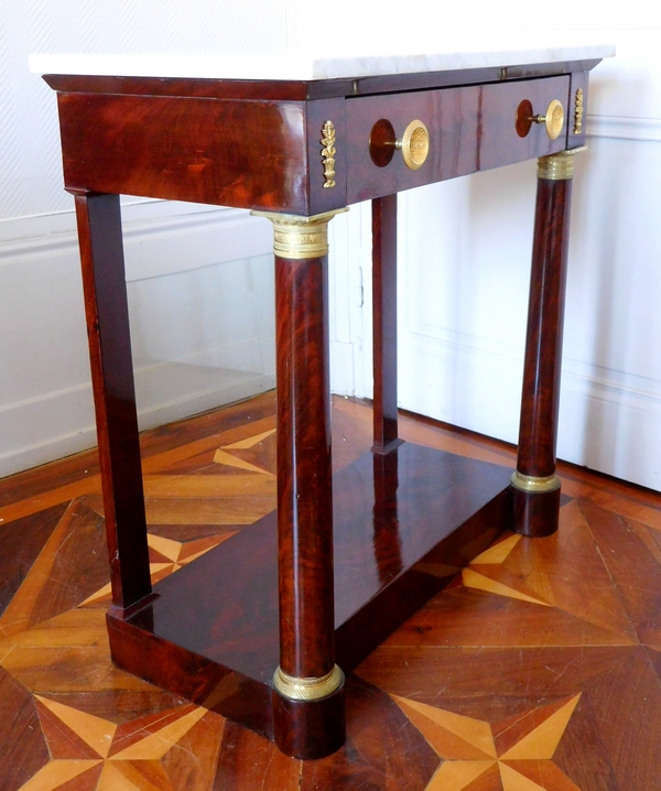 Small Empire mahogany console, mercury gilt bronze, early 19th century