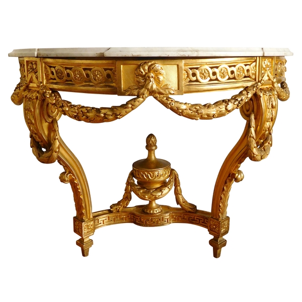 Console demi-lune en bois doré richement sculptée d’époque Louis XVI